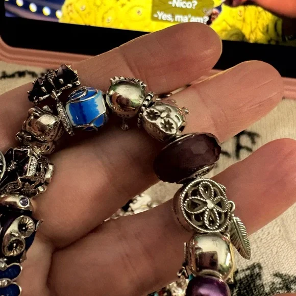 Linx bracelet with owl and butterfly charms